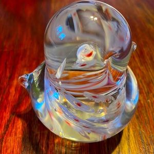 Little chick paper weight with white and red specks.  Tag on bottom.